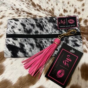 NWT Makeup junkie size mini Black and Pink Cosmetic Bag with Tassel Accent